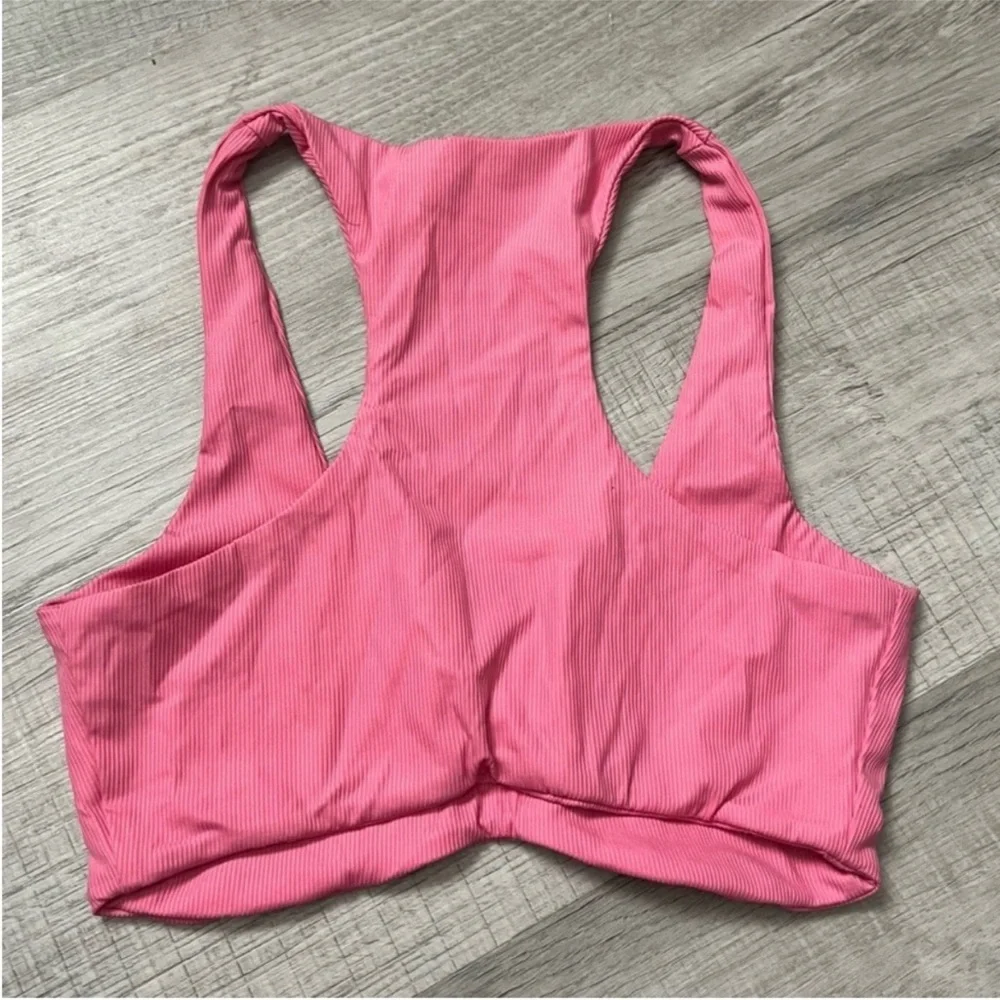 NEW NAKED WARDROBE Pink Ribbed Racerback Bra Top
Size Small - Picture 7 of 12